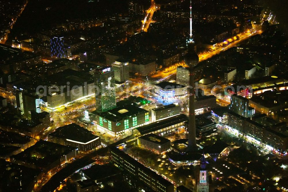 Berlin at night from the bird perspective: Night lighting The city center in the downtown area Ost on Berliner Fernsehturm - Alexanderstrasse - Rathausstrasse in the district Mitte in Berlin, Germany