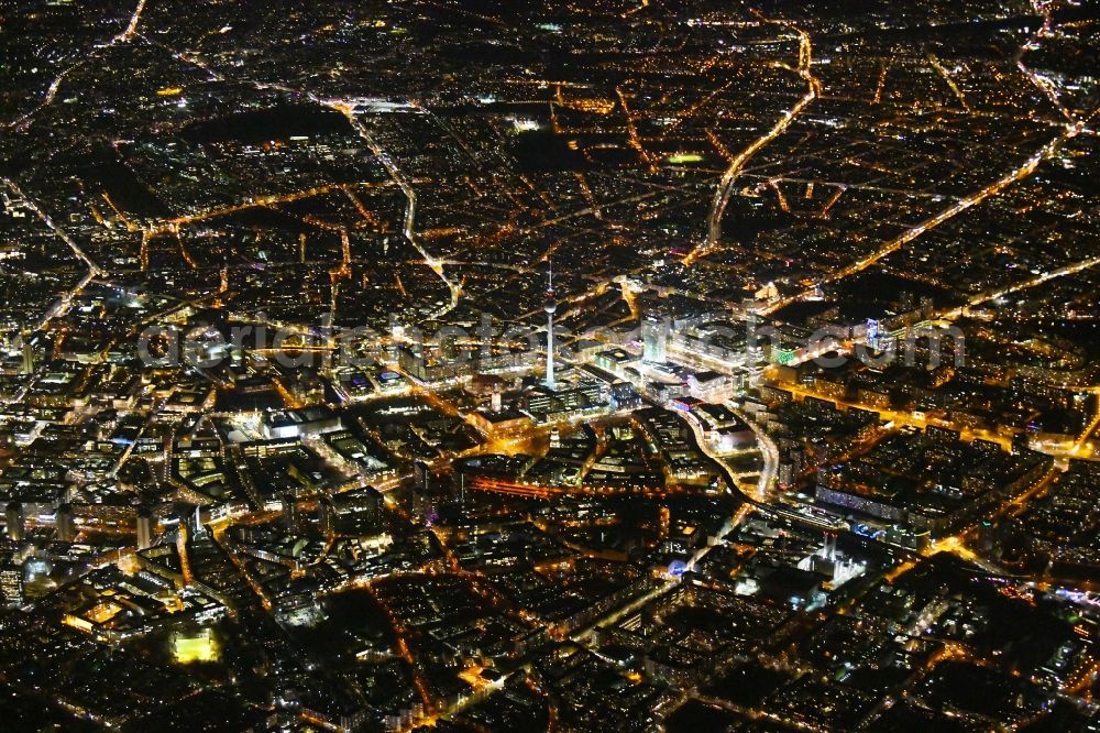 Berlin at night from the bird perspective: Night lighting The city center in the downtown area Ost on Berliner Fernsehturm - Alexanderstrasse - Rathausstrasse - Unter den Linden in the district Mitte in Berlin, Germany