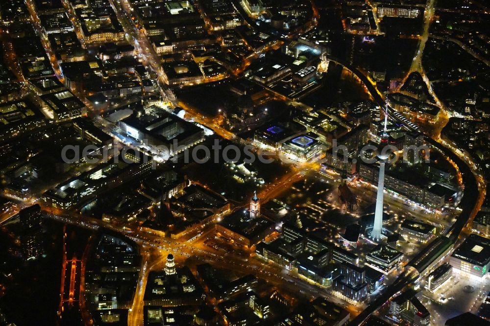 Aerial photograph at night Berlin - Night lighting The city center in the downtown area Ost on Berliner Fernsehturm - Alexanderstrasse - Rathausstrasse - Unter den Linden in the district Mitte in Berlin, Germany