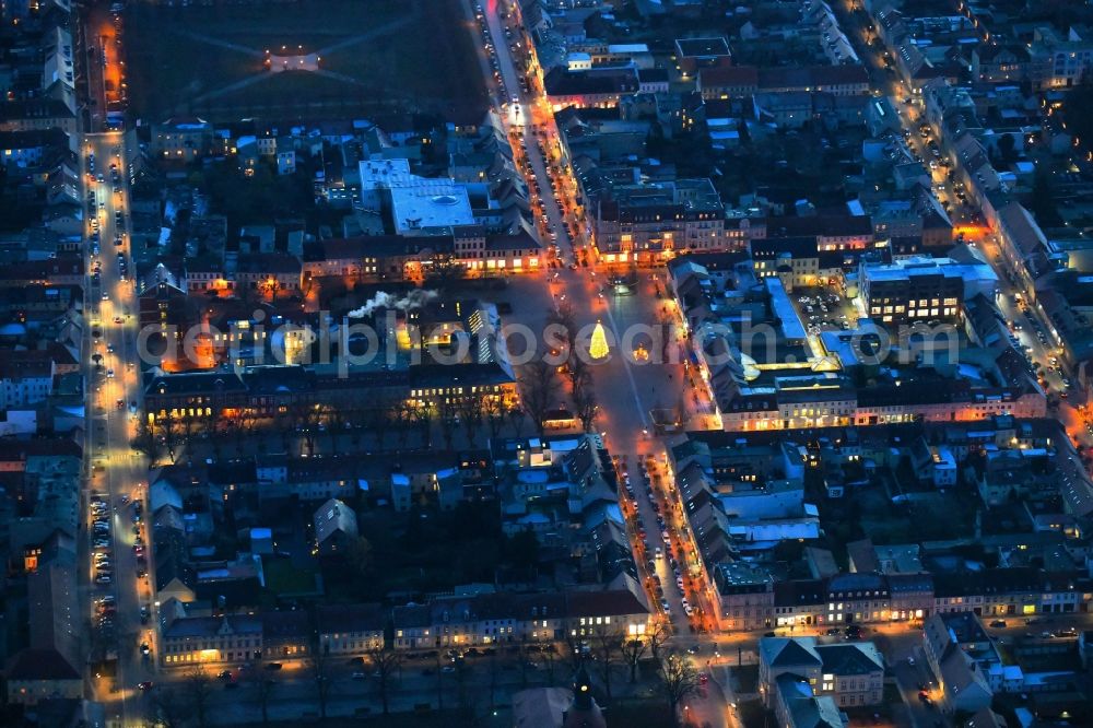 Aerial photograph at night Neuruppin - Night lighting The city center in the downtown area on Schulplatz in Neuruppin in the state Brandenburg, Germany