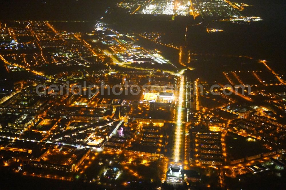 Aerial photograph at night Schwedt/Oder - Night lighting The city center in the downtown area along the Lindenallee - federal street B166 in Schwedt / Oder in the state Brandenburg, Germany