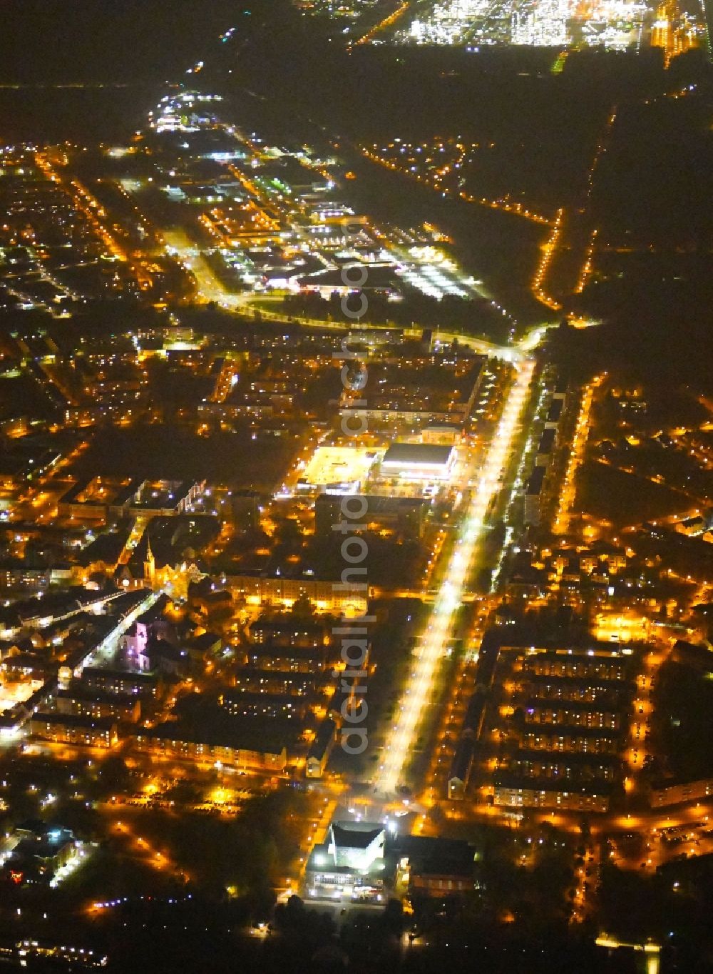 Aerial image at night Schwedt/Oder - Night lighting The city center in the downtown area along the Lindenallee - federal street B166 in Schwedt / Oder in the state Brandenburg, Germany