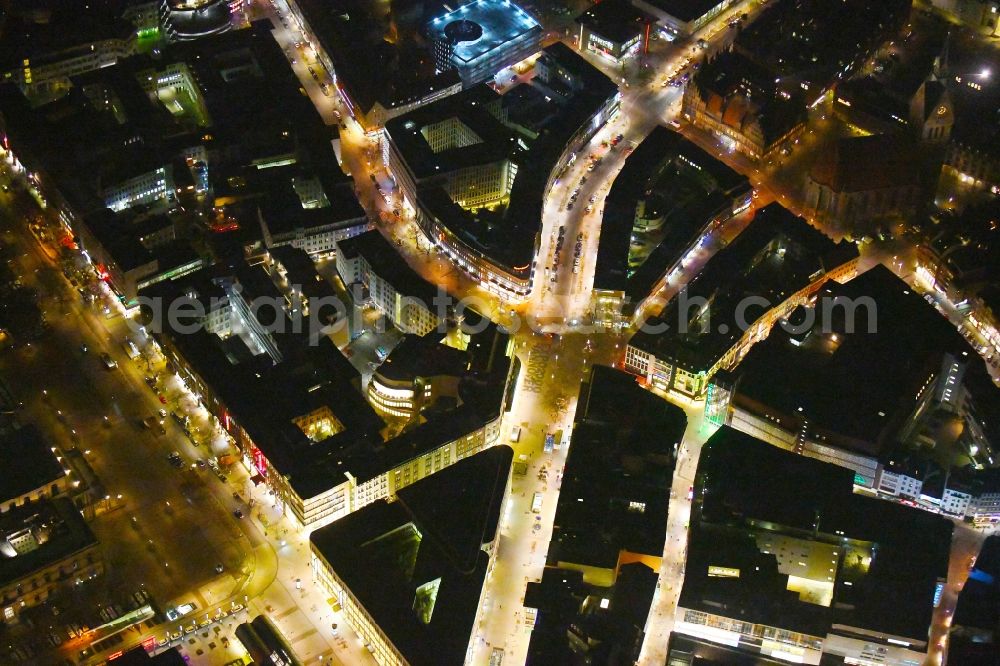 Aerial image at night Hannover - Night lighting The city center in the downtown area Georgstrasse - Bahnhofstrasse - Rathenaustrasse - Karmarschstrasse - Osterstrasse in Hannover in the state Lower Saxony, Germany