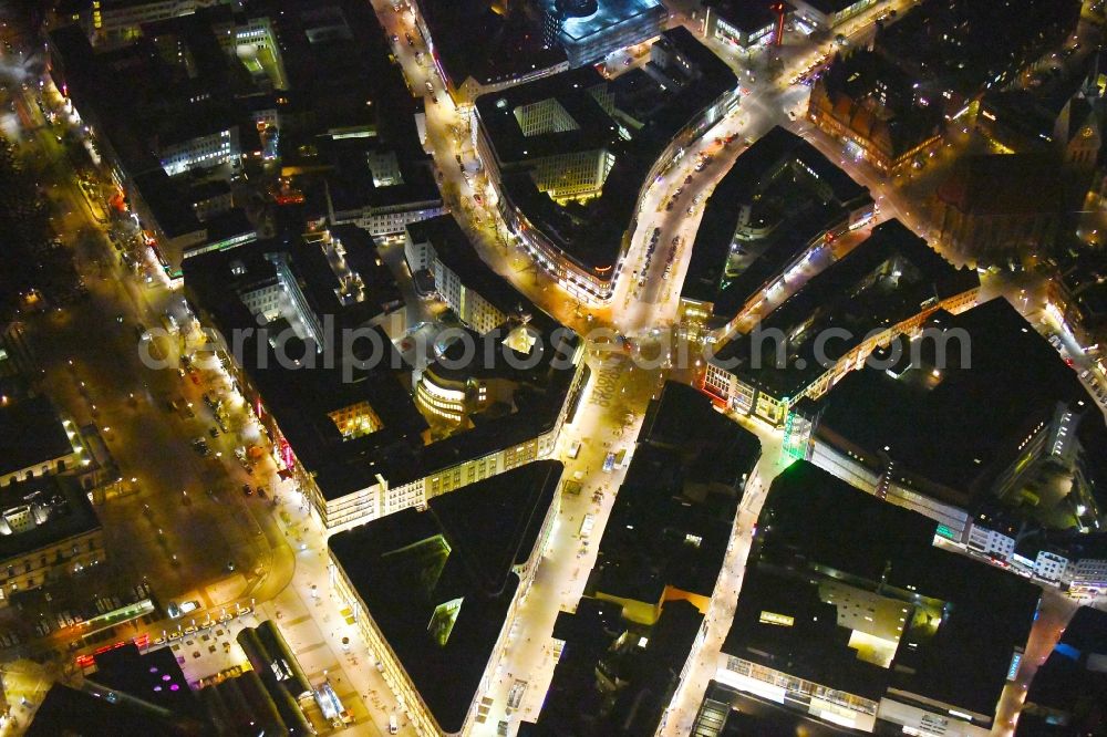 Hannover at night from above - Night lighting The city center in the downtown area Georgstrasse - Bahnhofstrasse - Rathenaustrasse - Karmarschstrasse - Osterstrasse in Hannover in the state Lower Saxony, Germany