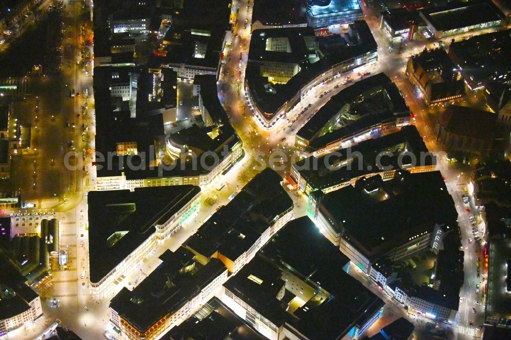 Hannover at night from above - Night lighting The city center in the downtown area Georgstrasse - Bahnhofstrasse - Rathenaustrasse - Karmarschstrasse - Osterstrasse in Hannover in the state Lower Saxony, Germany