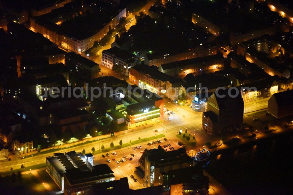 Rostock at night from the bird perspective: Night lighting The city center in the downtown area Am Strande in Rostock in the state Mecklenburg - Western Pomerania, Germany