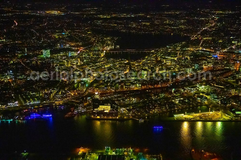 Hamburg at night from above - Night lighting city center in the downtown area on the banks of river course of the River Elbe in Hamburg, Germany