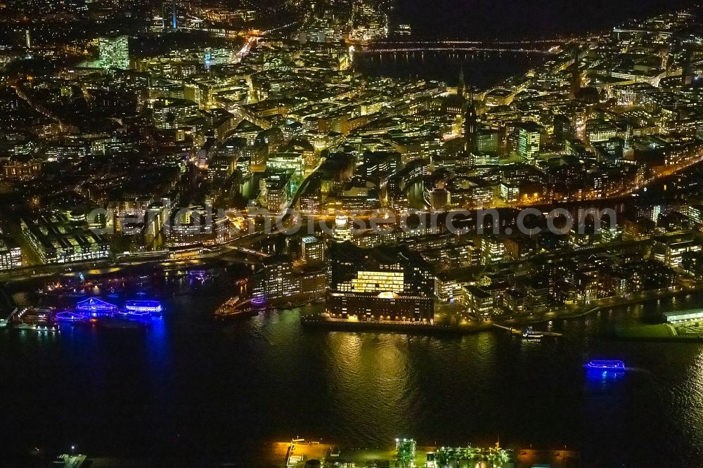 Aerial photograph at night Hamburg - Night lighting city center in the downtown area on the banks of river course of the River Elbe in Hamburg, Germany