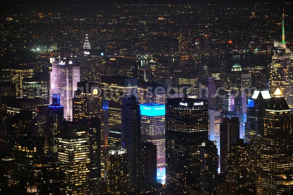 New York at night from above - Night lighting City center with the skyline in the downtown area on Broadway in the district Manhattan in New York in United States of America