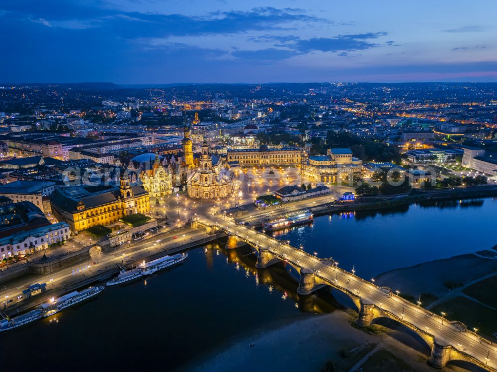 Dresden at night from the bird perspective: Night lighting road bridge structure Augustus Bridge over the river banks of the Elbe in Dresden in the federal state of Saxony, Germany