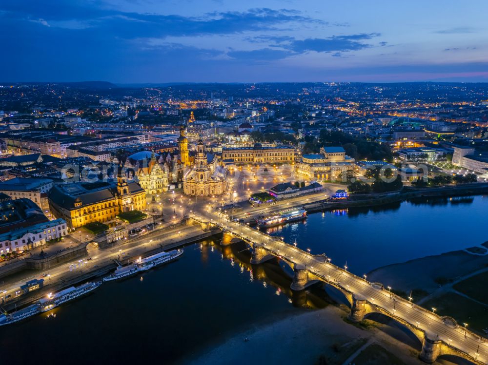 Aerial photograph at night Dresden - Night lighting road bridge structure Augustus Bridge over the river banks of the Elbe in the district Altstadt in Dresden in the federal state of Saxony, Germany