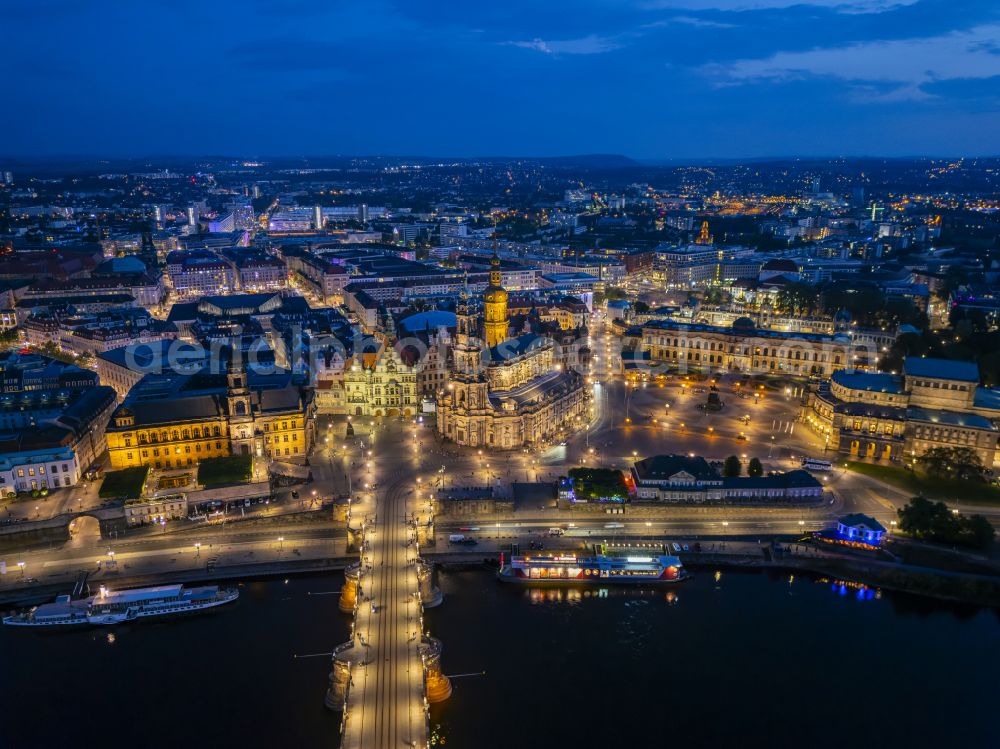 Aerial image at night Dresden - Night lighting road bridge structure Augustus Bridge over the river banks of the Elbe in the district Altstadt in Dresden in the federal state of Saxony, Germany