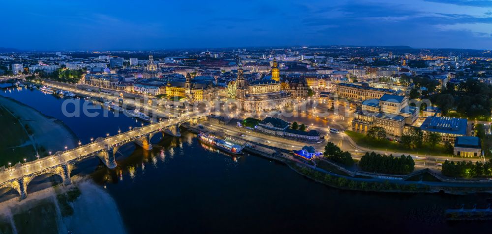 Dresden at night from the bird perspective: Night lighting road bridge structure Augustus Bridge over the river banks of the Elbe in the district Altstadt in Dresden in the federal state of Saxony, Germany