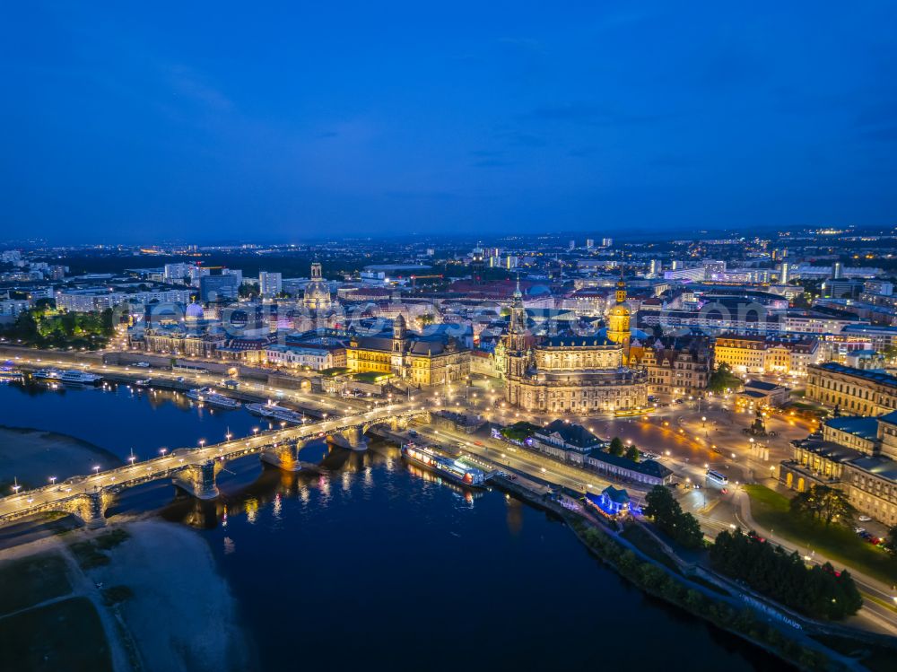 Aerial photograph at night Dresden - Night lighting road bridge structure Augustus Bridge over the river banks of the Elbe in the district Altstadt in Dresden in the federal state of Saxony, Germany