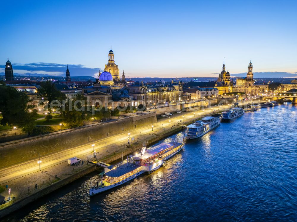 Aerial photograph at night Dresden - Night lighting road bridge structure Augustus Bridge over the river banks of the Elbe in the district Altstadt in Dresden in the federal state of Saxony, Germany