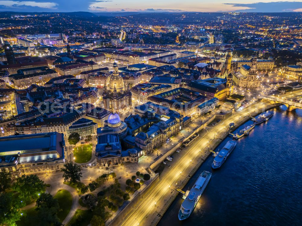 Aerial image at night Dresden - Night lighting road bridge structure Augustus Bridge over the river banks of the Elbe in the district Altstadt in Dresden in the federal state of Saxony, Germany