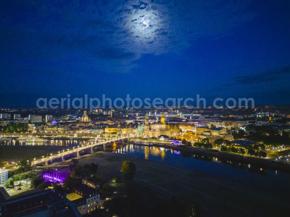 Aerial photograph at night Dresden - Night lighting road bridge structure Augustus Bridge over the river banks of the Elbe in the district Altstadt in Dresden in the federal state of Saxony, Germany