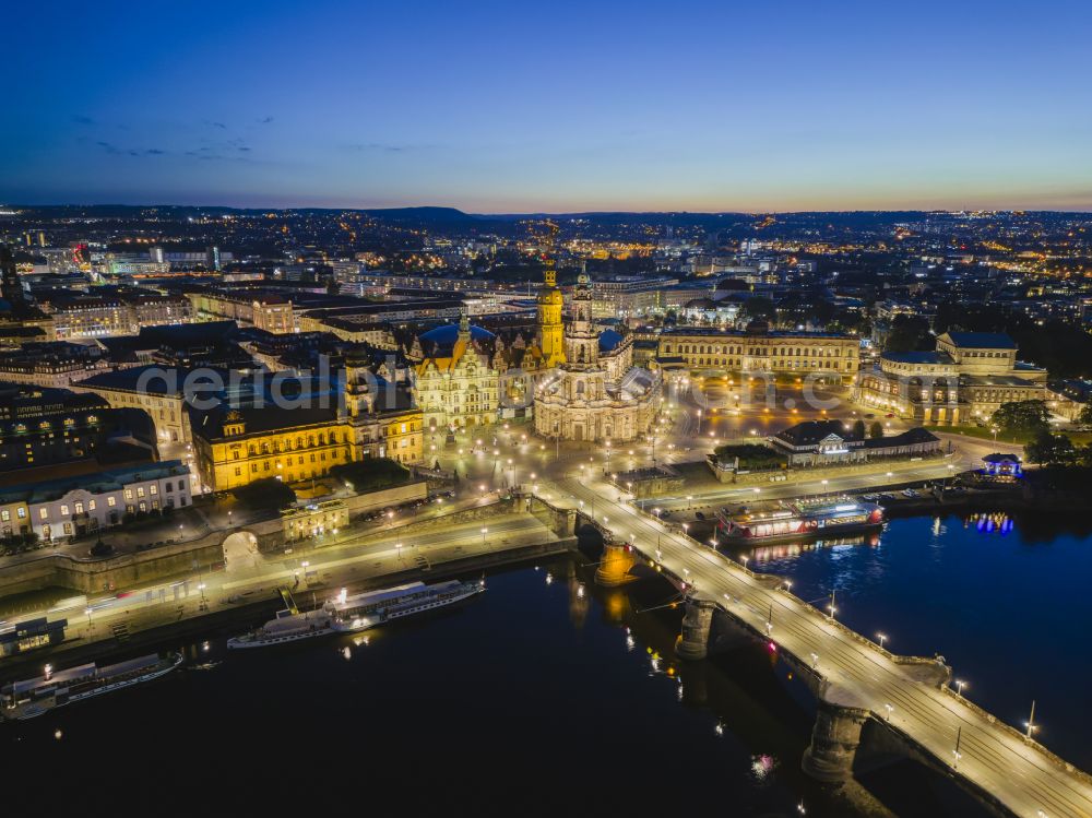 Aerial image at night Dresden - Night lighting road bridge structure Augustus Bridge over the river banks of the Elbe in the district Altstadt in Dresden in the federal state of Saxony, Germany