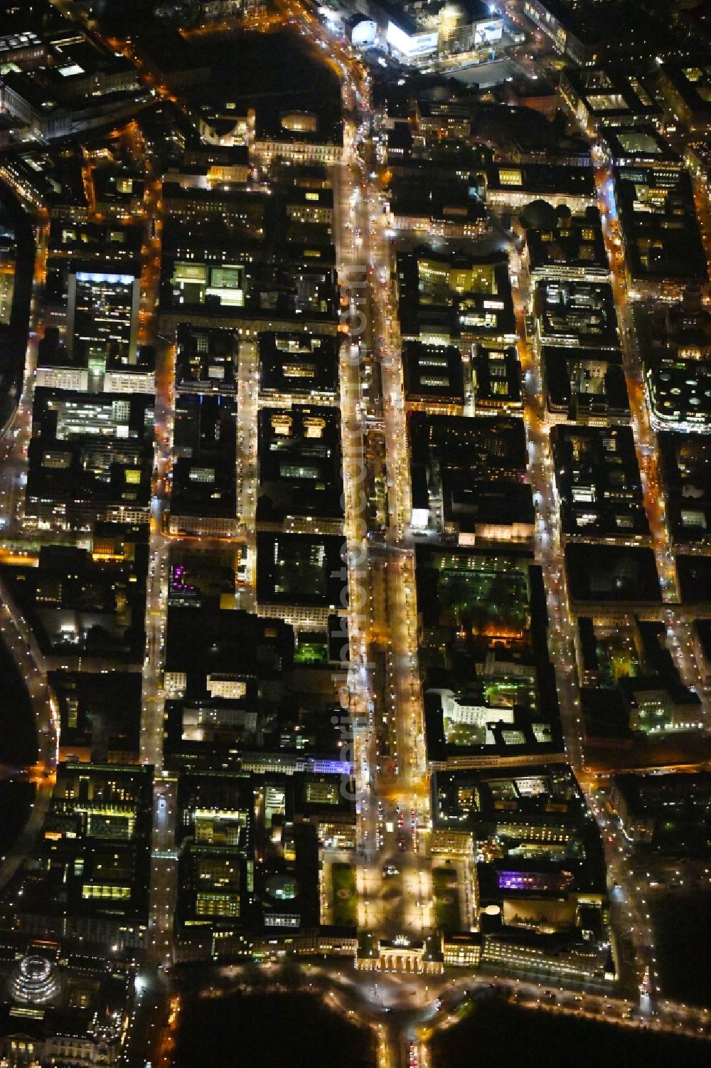 Aerial photograph at night Berlin - Night lighting Street guide of famous promenade and shopping street Brandenburger Tor - Pariser Platz - Unter den Linden in the district Mitte in Berlin, Germany