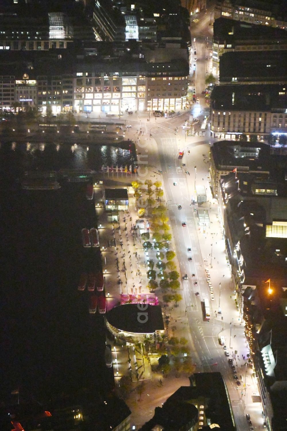 Hamburg at night from above - Night lighting Street guide of famous promenade and shopping street Jungfernstieg with Alsterpavillon in Hamburg, Germany