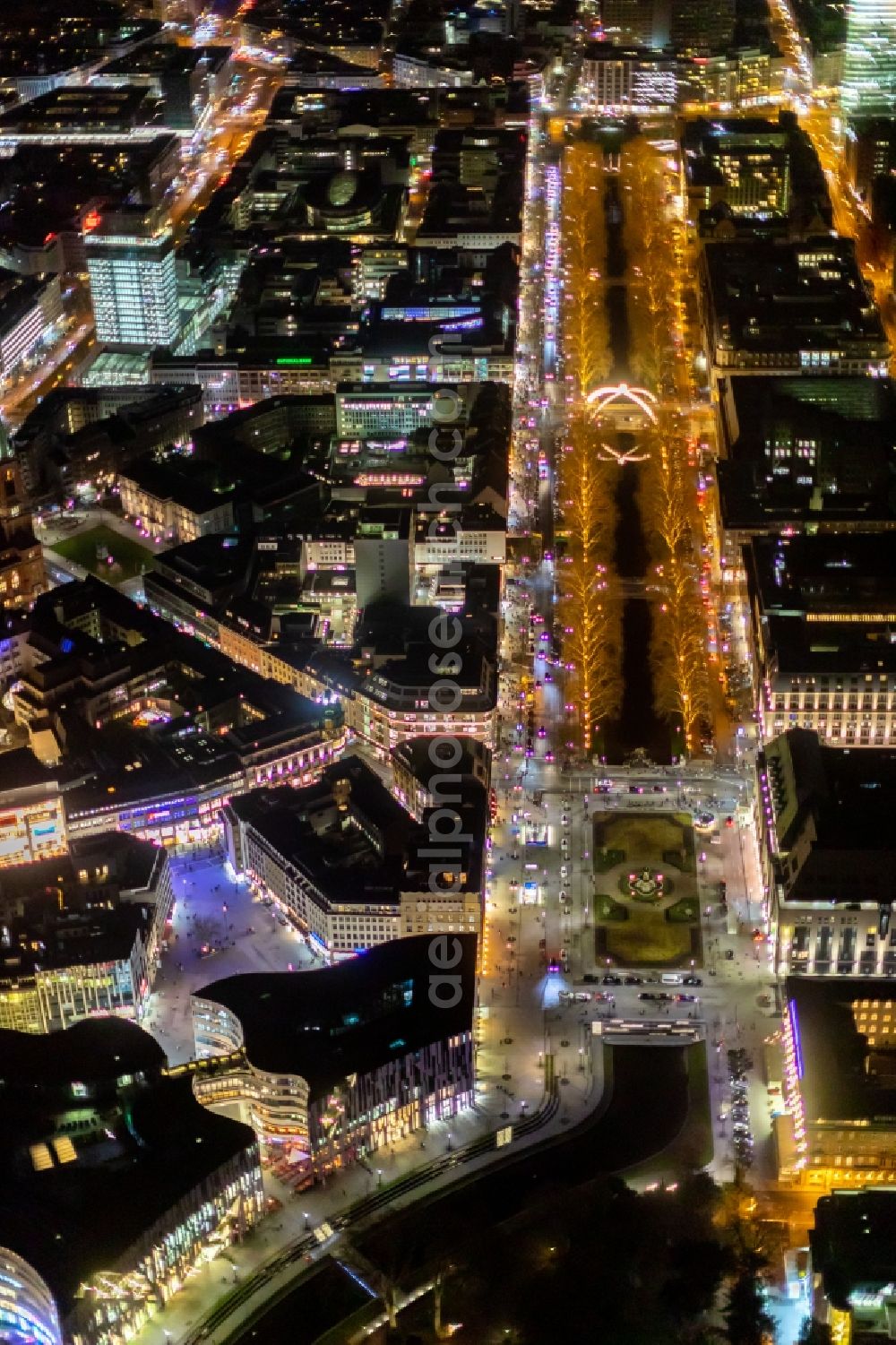 Aerial photograph at night Düsseldorf - Night lighting street guide of famous promenade and shopping street Koenigsallee in the district Stadtmitte in Duesseldorf in the state North Rhine-Westphalia, Germany