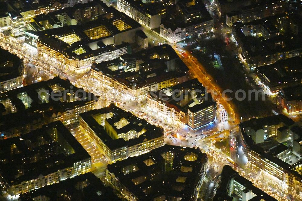 Berlin at night from the bird perspective: Night lighting Street guide of famous promenade and shopping street Kurfuerstendamm - Olivaer Platz in the district Charlottenburg in Berlin, Germany