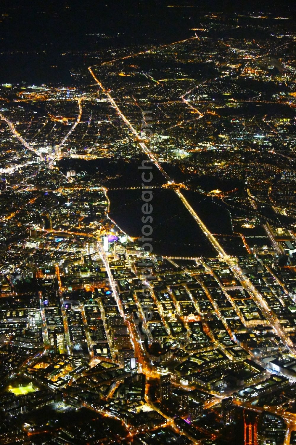 Berlin at night from the bird perspective: Night lighting Street guide of famous promenade and shopping street Leipziger Strasse - Friedrichstrasse - Unter den Linden - Str. of 17.Juni in the district Mitte in Berlin, Germany