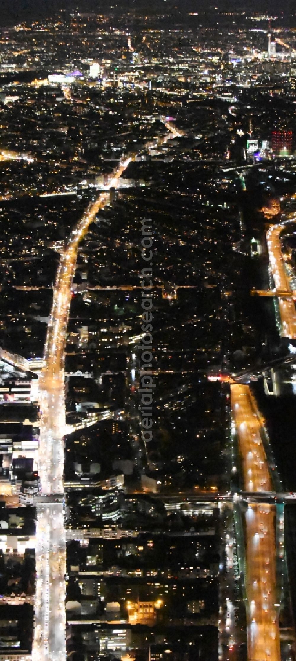 Aerial photograph at night Berlin - Night view street guide of famous promenade and shopping street Schlossstrasse in the district Steglitz in Berlin