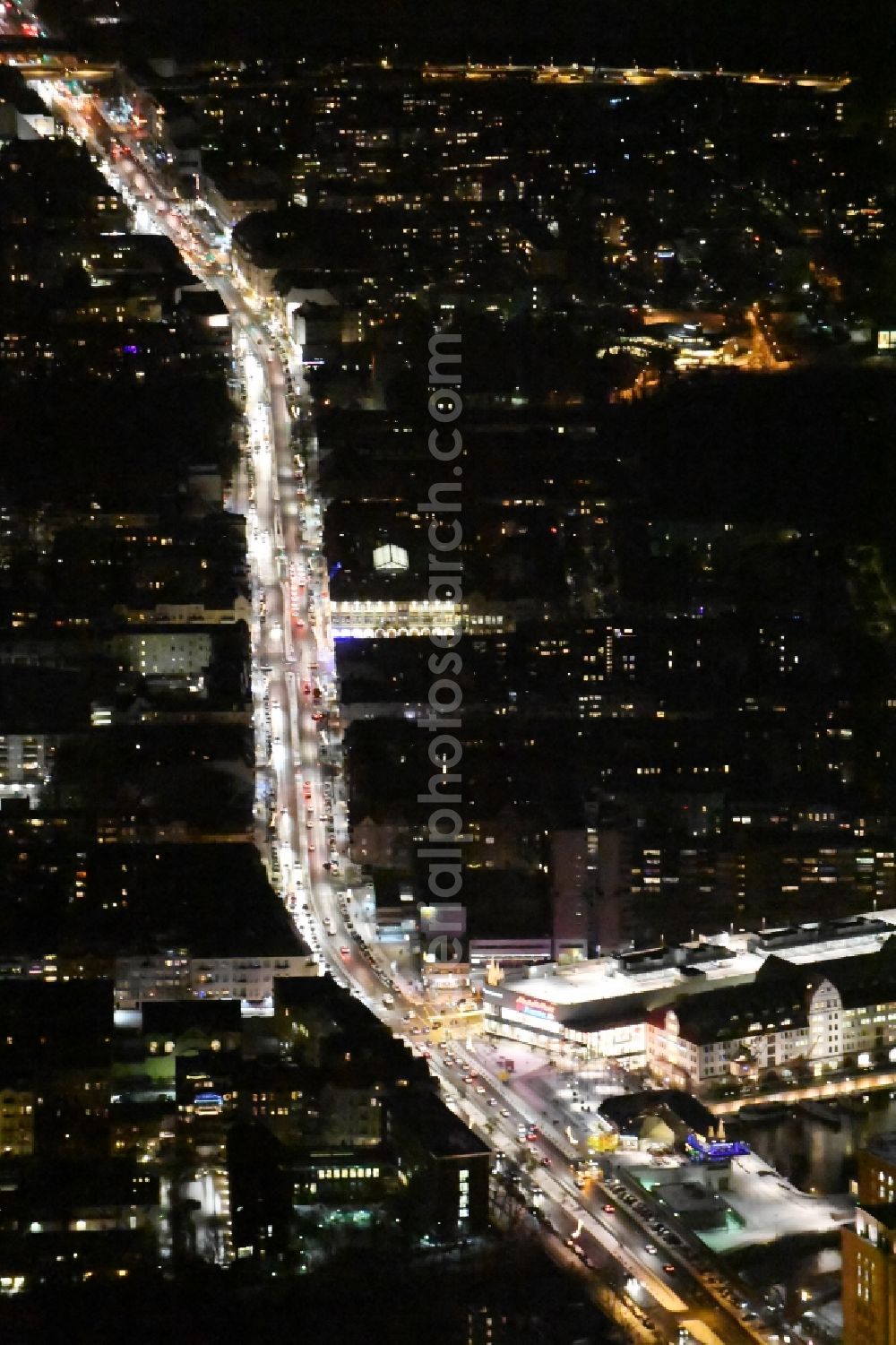 Berlin at night from above - Night view street guide of famous promenade and shopping street Tempelhofer Damm in the district Tempelhof in Berlin