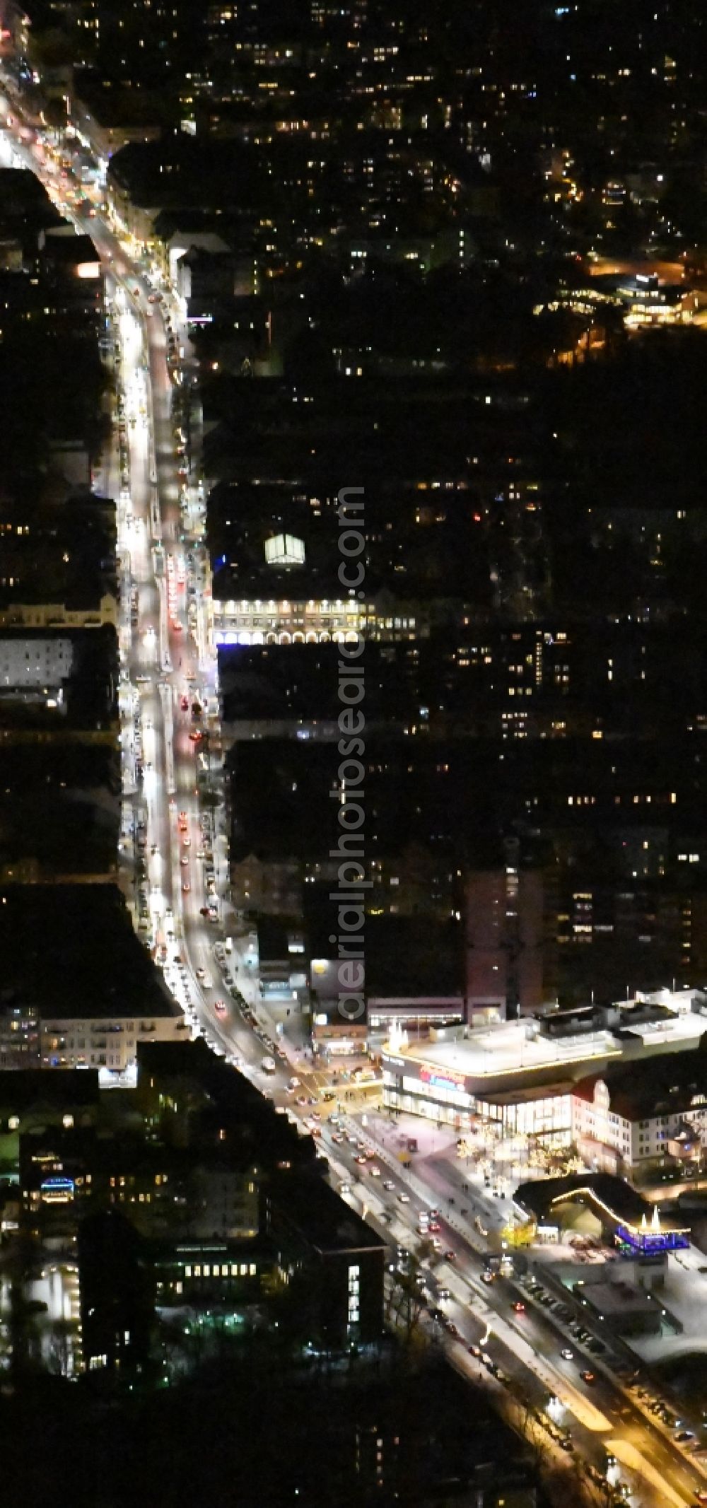 Berlin at night from the bird perspective: Night view street guide of famous promenade and shopping street Tempelhofer Damm in the district Tempelhof in Berlin