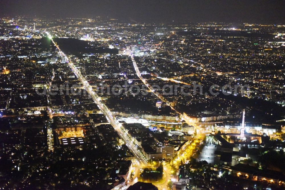 Berlin at night from above - Night view street guide of famous promenade and shopping street Theodor-Heuss-Platz - Kaiserdamm-Masurenallee in Berlin