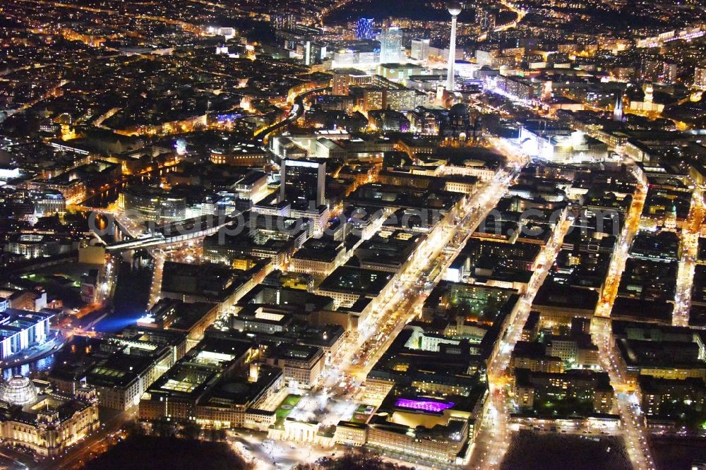 Aerial photograph at night Berlin - Street guide of famous promenade and shopping street Unter den Linden with place Pariser Platz and gate Brandenburger Tor in Berlin