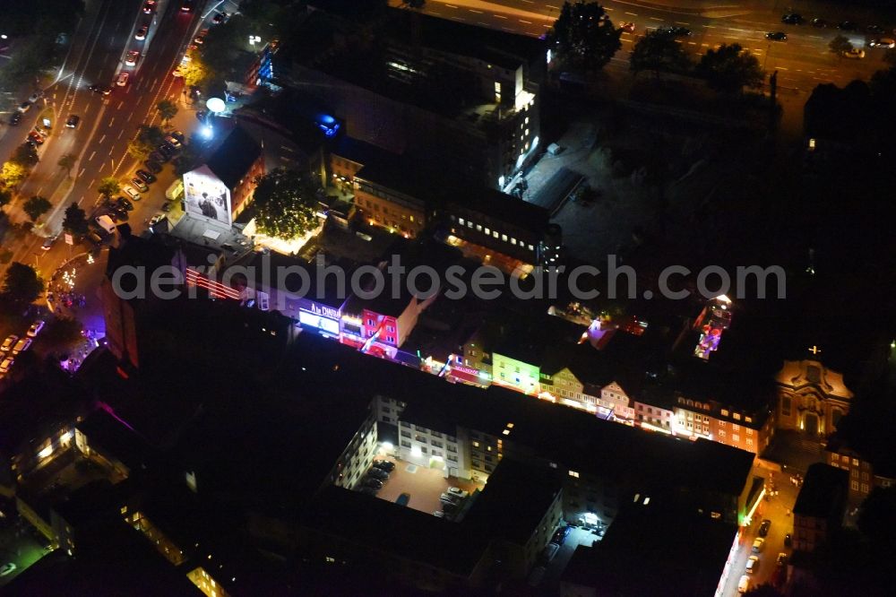 Hamburg at night from the bird perspective: Night view street guide of famous promenade and shopping street Grosse Freiheit in Hamburg. On the side street of the Reeperbahn there are restaurants such as A la Charm, the Dollhouse and the Olivia Jones Bar