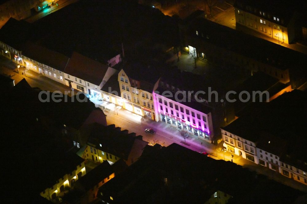 Strausberg at night from above - Night lighting Street guide of promenade and shopping street Grosse Strasse in Strausberg in the state Brandenburg, Germany