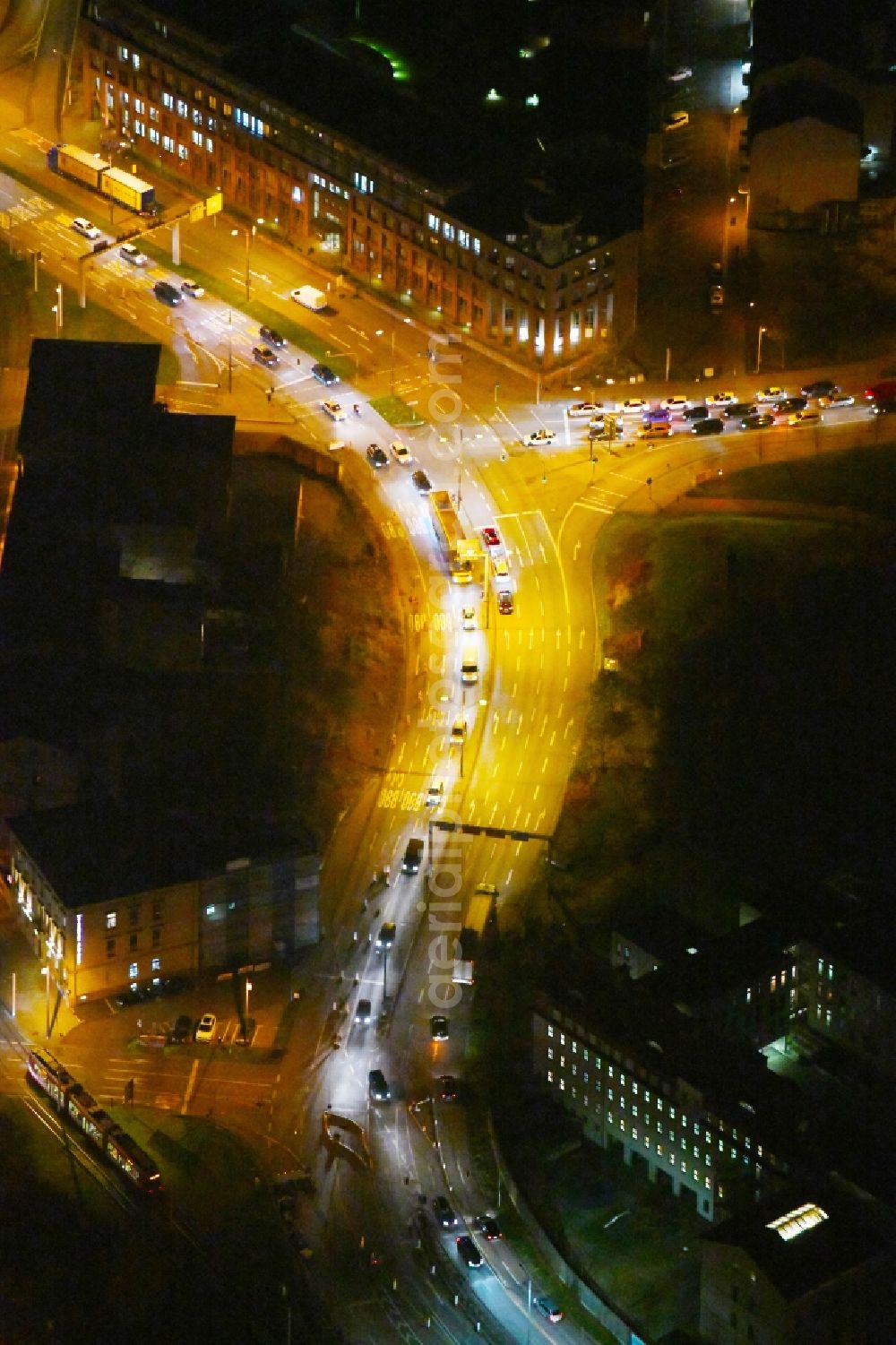 Aerial image at night Halle (Saale) - Night lighting Street - road guidance Hallorenring in Halle (Saale) in the state Saxony-Anhalt, Germany