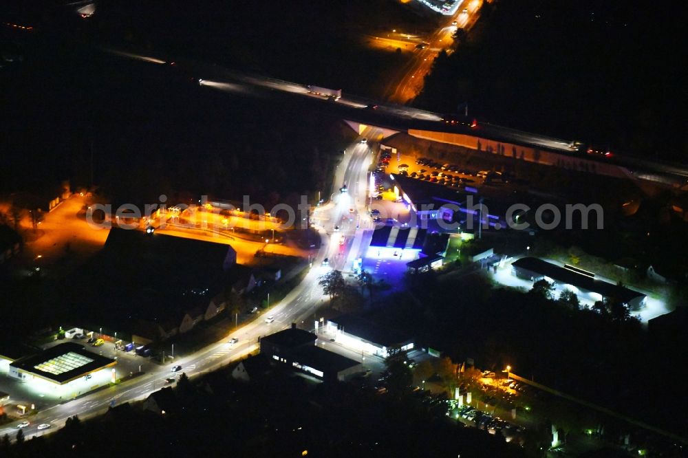 Aerial image at night Fürstenwalde/Spree - Night lighting Street - road guidance of Saarower Chaussee in Fuerstenwalde/Spree in the state Brandenburg, Germany