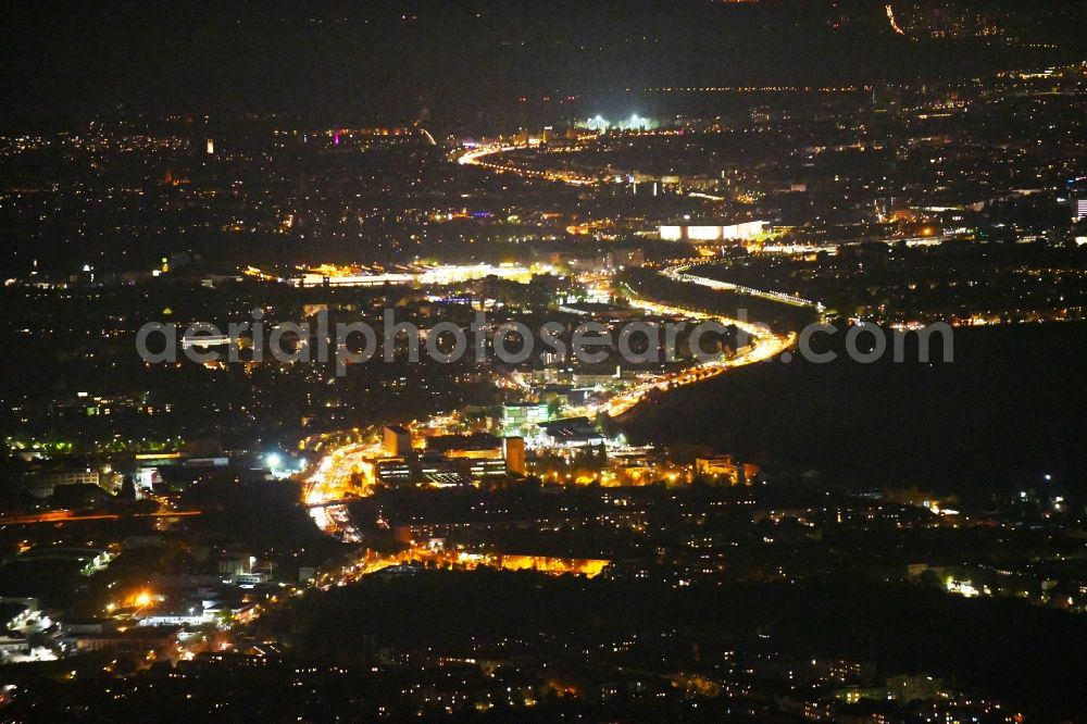 Berlin at night from the bird perspective: Night lighting Street - road guidance of Stadtautobahn A100 in the district Tempelhof in Berlin, Germany