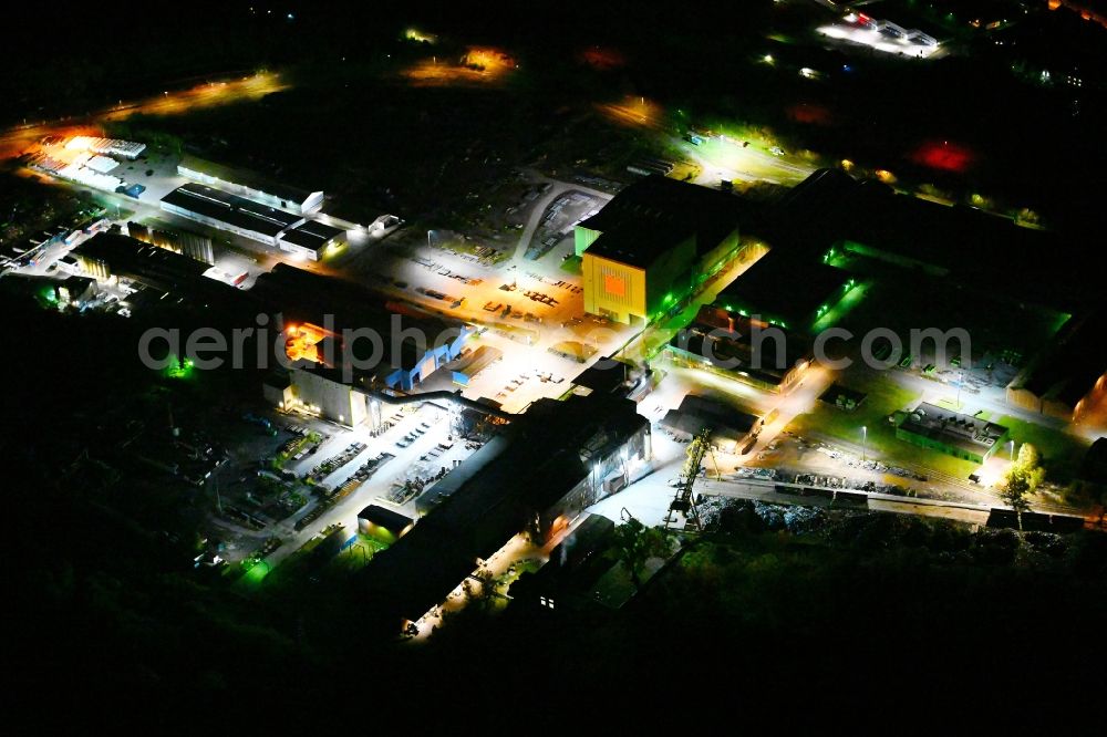 Bous at night from above - Night lighting technical equipment and production facilities of the steelworks on Saarstrasse in Bous in the state Saarland, Germany