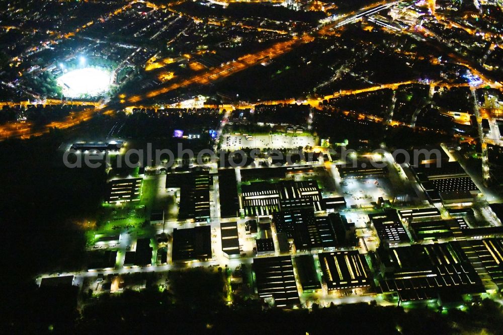 Aerial image at night Osnabrück - Night lighting Technical equipment and production facilities of the steelworks of KME Germany GmbH & Co. KG on Klosterstrasse in Osnabrueck in the state Lower Saxony, Germany