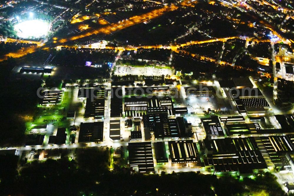 Osnabrück at night from above - Night lighting Technical equipment and production facilities of the steelworks of KME Germany GmbH & Co. KG on Klosterstrasse in Osnabrueck in the state Lower Saxony, Germany