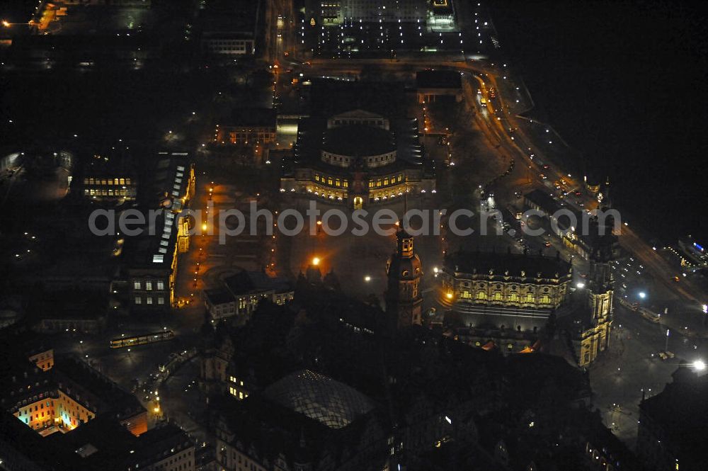 Dresden at night from above - Nachtaufnahme der Altstadt rund um den Theaterplatz mit der Katholischen Hofkirche, dem Residenzschloss und der Semperoper. Night shot of the old town around the Theatre Square with the Catholic Court Church, the Royal Palace and the Semper Opera.