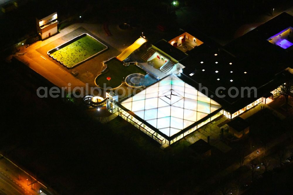 Dresden at night from above - Night lighting Spa and swimming pools at the swimming pool of the leisure facility Georg-Arnhold-Bad of the Dresdner Baeder GmbH with sauna in Dresden in the state Saxony