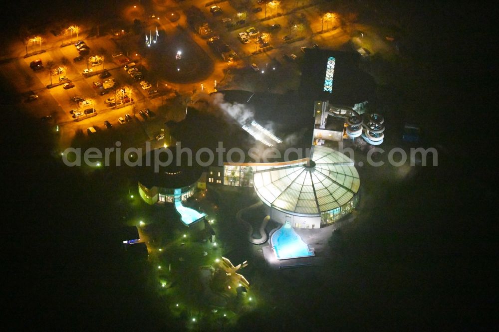 Aerial image at night Zeulenroda-Triebes - Night lighting Spa and swimming pools at the swimming pool of the leisure facility Waikiki Zeulenroda in Zeulenroda-Triebes in the state Thuringia, Germany