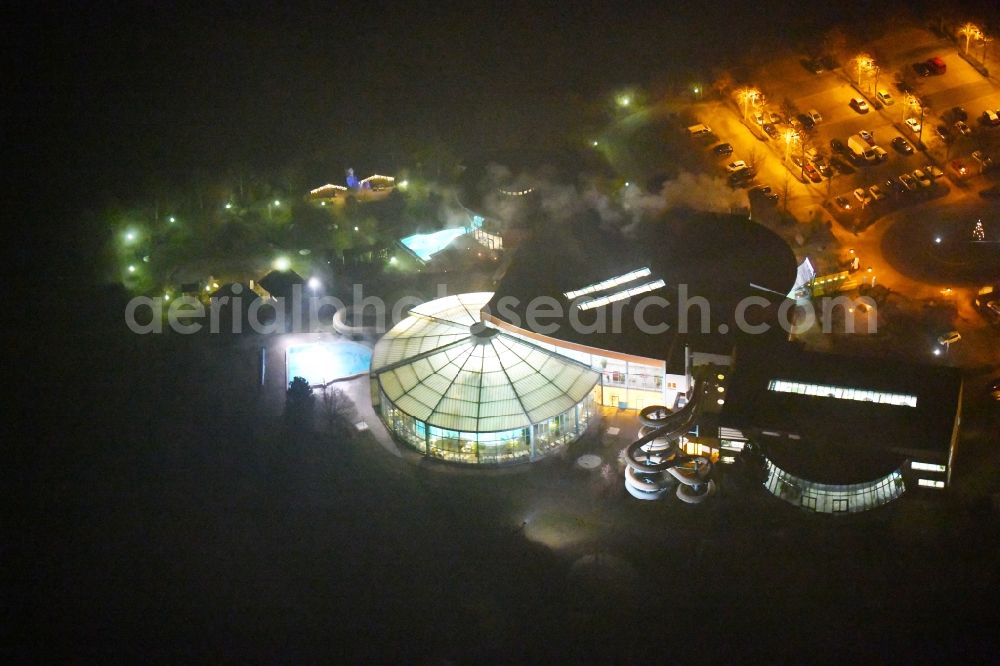 Aerial image at night Zeulenroda-Triebes - Night lighting Spa and swimming pools at the swimming pool of the leisure facility Waikiki Zeulenroda in Zeulenroda-Triebes in the state Thuringia, Germany