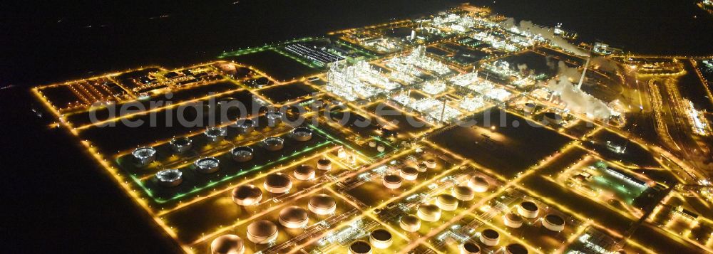 Leuna at night from the bird perspective: Night lighting tOTAL refinery in central Germany in Leuna in the federal state of Saxony-Anhalt. The TOTAL refinery chemical site Leuna is one of the most modern refineries in Europe