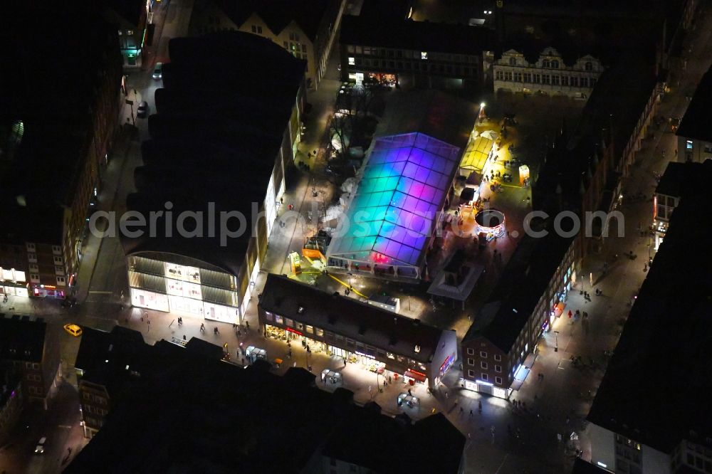 Lübeck at night from above - Night lighting tourist attraction and sightseeing Openair-Eisstadion Am Markt in the district Innenstadt in Luebeck in the state Schleswig-Holstein, Germany