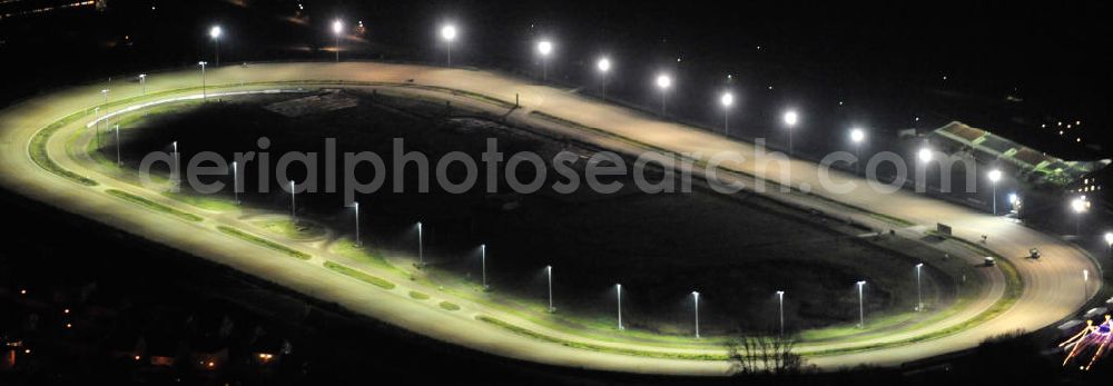 Aerial image at night Berlin - Nachtaufnahme der Trabrennbahn / des Pferdesportpark in Berlin Karlshorst. Night shot of the trotting course Berlin in the district of Karlshorst