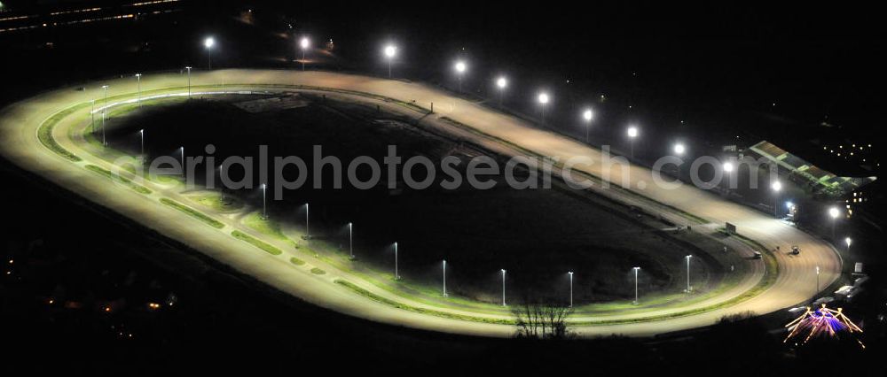 Berlin at night from above - Nachtaufnahme der Trabrennbahn / des Pferdesportpark in Berlin Karlshorst. Night shot of the trotting course Berlin in the district of Karlshorst