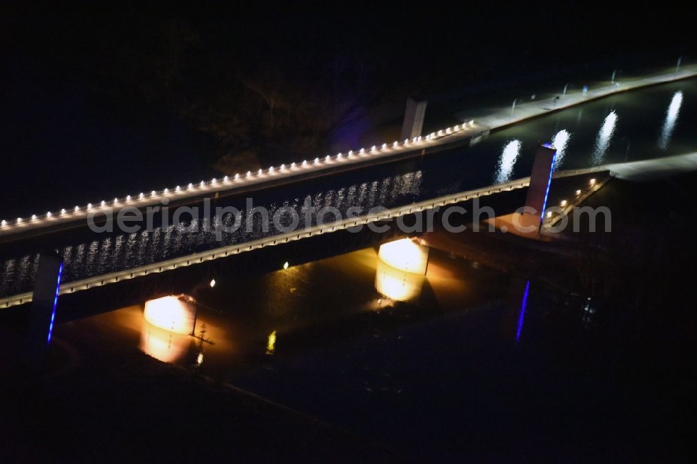 Aerial image at night Hohenwarthe - Night lighting water way on the Trough bridge crossing from the Mittelland Canal over the River Elbe to the Elbe-Havel Canal to the waterway intersection in Hohenwarthe in Saxony-Anhalt