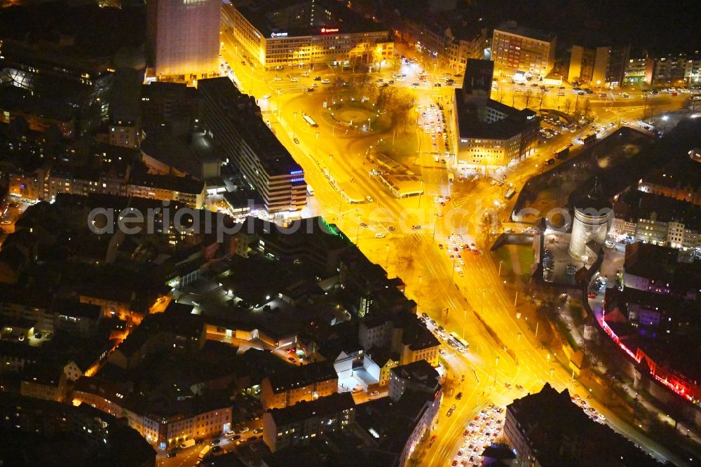 Aerial photograph at night Nürnberg - Night lighting Tower building Spittlertorturm on Spittlertorgraben - Am Plaerrer the rest of the former historic city walls in the district Himpfelshof in Nuremberg in the state Bavaria, Germany